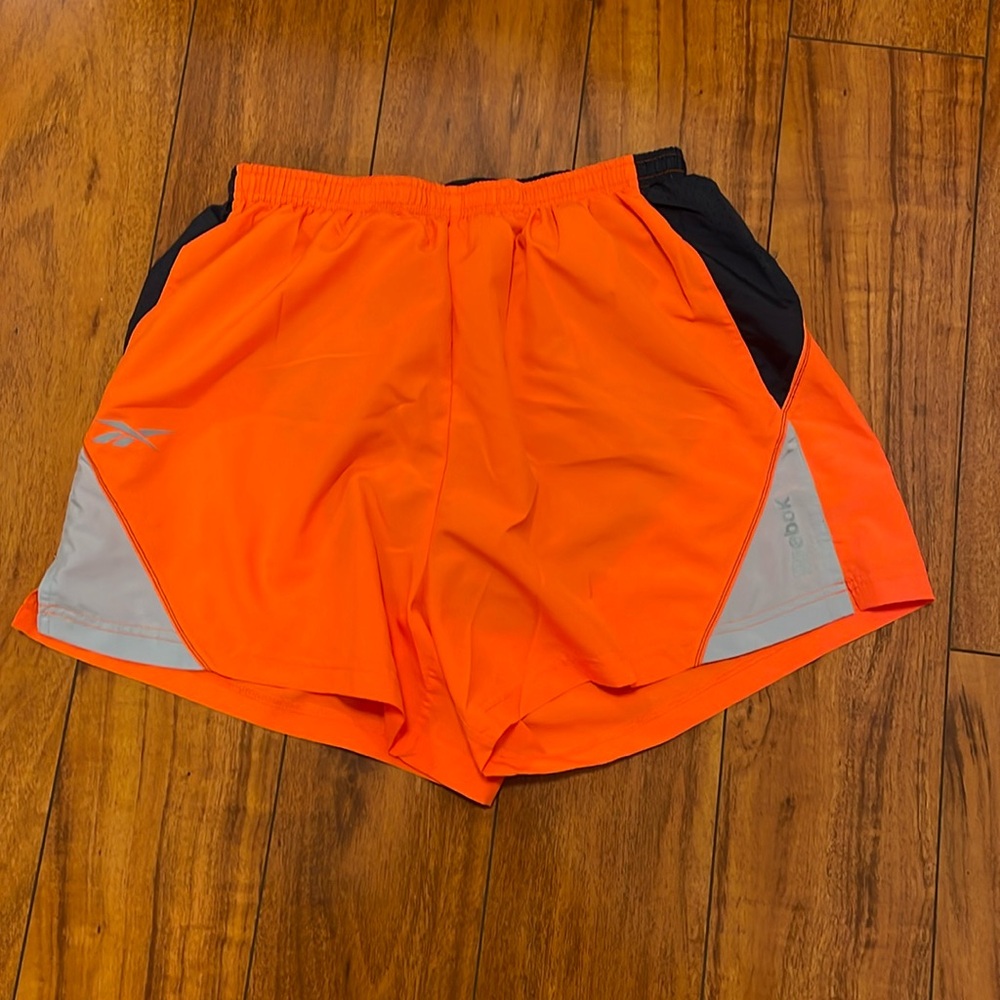 Reebok orange running shorts size M